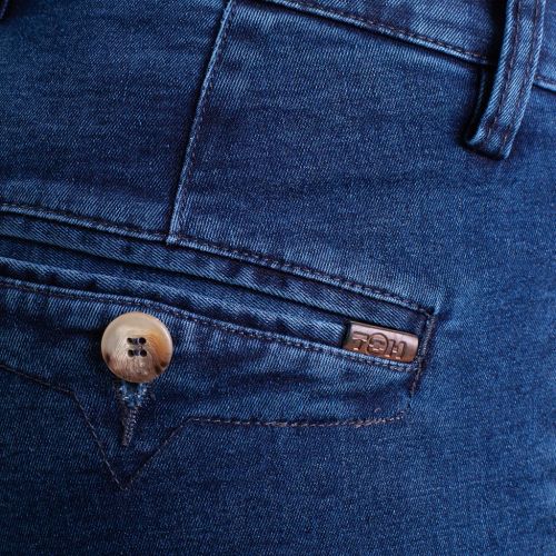 Color denim azul medio - Pantalón TCH Sport tipo chino sin pinzas en tejido vaquero de Algodón con lycra REGULAR